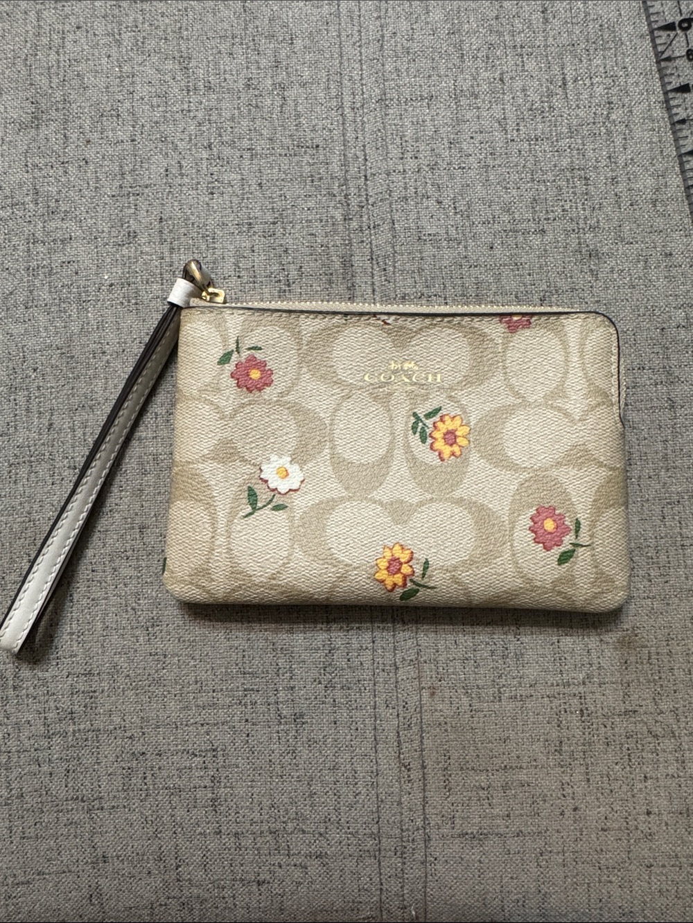 Coach Beige Signature Floral Wristlet with Gold Logo